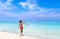 Little boy playing in sand on tropical beach