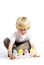 Little boy plays with easter eggs