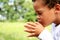 little boy praying to God stock photo