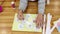 Little boy a preschooler plays at the table in a handmade educational game for children. The concept of preschool