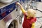 Little boy puts coin in the drying machine in the public Laundry