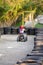 Little Boy Rides a Motorcycle ATV with Four Wheels. Outdoor Activity for Kid on an Electric Racing Quad Bike Machine