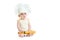 Little boy with rolling pin and cook hat isolated