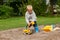 Little boy in the sandbox.