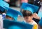 Little boy showing graduated hhat uniform at kindergarten school