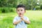 Little boy showing pray gesture