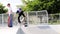 Little boy skateboarder hand up