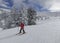 Little boy skiing in a solitary montain