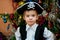 Little boy in the suit of pirate