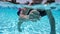 Little boy swim in pool, underwater shoot