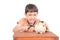 Little boy taking hammer trying to broke piggy bank on the table