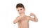 Little boy tries to show his biceps muscles