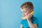 Little Boy tries to speak by means of a banana instead of phone