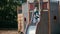 Little Boy is Trying to Climb a Slide but then He Fails and Riding Down