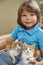 Little boy with two red kitten in hands close up. Best friends. Interaction of children with pets