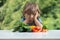 Little boy unhappy with vegetable meal