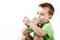 Little boy using inhaler for asthma