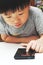 Little boy using smartphone, toddler, device, vertical