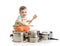 Little boy using wooden spoons to bang pans drumset