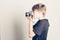 Little boy with vintage reflex camera