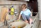 Little boy washing sink on kitchen