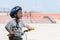Little boy wearing helmets ridding bike