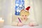 Little boy writing the letter to Santa. Child dreams of a gift that he can receive. Magic mail of Santa Claus. Traditions around