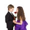 Little boyfriend gives a flower to girlfriend.
