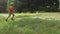 Little boys playing american soccer outdoors