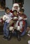 Little boys sit on Santa\'s lap at Christmas dinner for US Soldiers at Wounded Warrior Center, Camp Pendleton, North of San Diego,