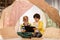 Little boys with tablet pc in kids tent at home