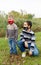 Little boys wearing protective mask in autumn park. Social distancing