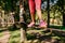 Little brave girl climbs in rope park, playground