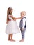 Little brother and sister isolated on a white background. Cute boy and girl standing together. Family concept.