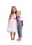 Little brother and sister isolated on a white background. Cute boy and girl standing together. Family concept.