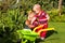 Little brothers enjoy garden