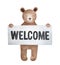 Little brown teddy bear holding note with message: `Welcome`.