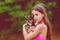 Little brunette girl in pink bathing. Teenager and dog. Girl and chihuahua