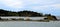 Little cabins on island in BC surrounded by Pacific Ocean