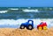 Little Cars on the Beach.Kids Toys on Tropical Sand Beach. Toy`s Cars.