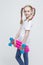 Little Caucasian Blond Girl with Nice Pigtails Posing With Pink Pennyboard