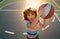 Little caucasian sports kid playing basketball holding ball with happy face. Portrait of sporty funny child.
