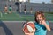 Little caucasian sports kid playing basketball holding ball with happy face. Thumbs up people.