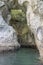 Little cave in white worn sheer cliffs at Mercury bay, New Zealand