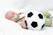 Little chap with soccer ball on white background