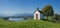 little chapel in idyllic bavarian landscape with lake view riegsee
