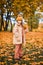 Little Child Baby Girl Caucasian Walking in Park with Leaf Autumn lden Fall