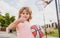 Little child boy playing basketball with basket ball, , thumbs up.. Active kids lifestyle.