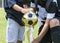 Little child boy touches soccer trophy cup golden football ball. Kids love football. Celebration and winners award
