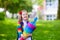 Little child with candy cone on first school day